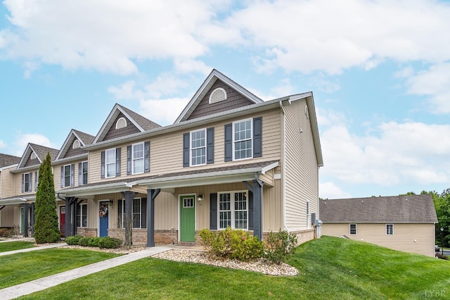 62 Squire Cir, Lynchburg, VA 24501 - view of front of house featuring a front yard, brick siding, and covered porch