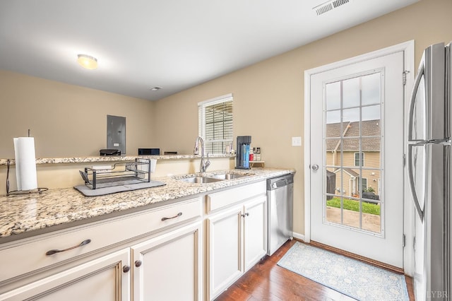 62 Squire Cir, Lynchburg, VA 24501 - kitchen with stainless steel appliances, a sink, dark wood-type flooring, and healthy amount of natural light