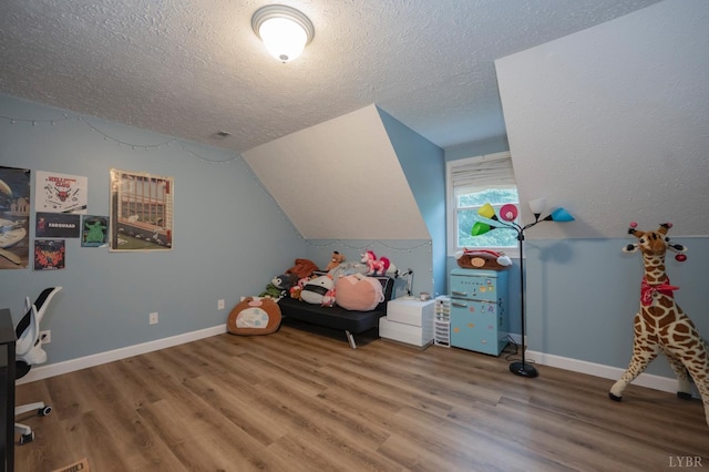 220 Swan Ln, Forest, VA 24551 - office featuring a textured ceiling, wood finished floors, baseboards, and vaulted ceiling