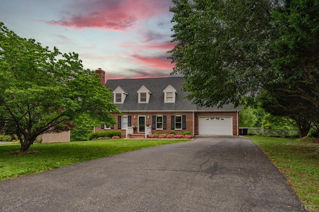 220 Swan Ln, Forest, VA 24551 - cape cod home with asphalt driveway, a garage, a chimney, and brick siding