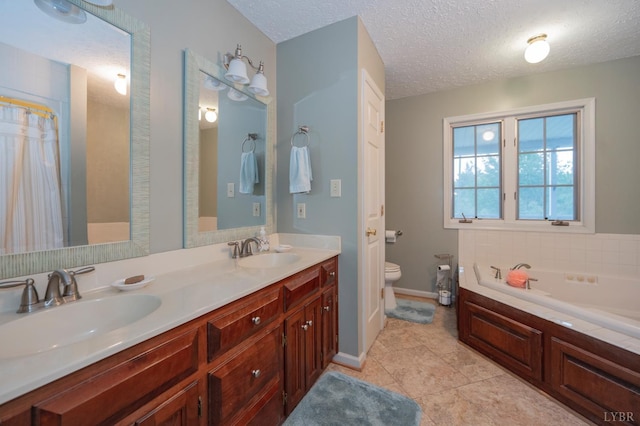 220 Swan Ln, Forest, VA 24551 - bathroom with toilet, a garden tub, double vanity, tile patterned floors, and baseboards