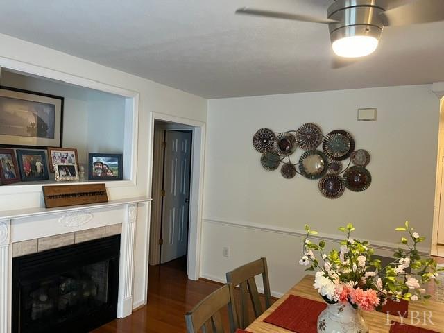 312 Addie Way, Lynchburg, VA 24501 - dining room with wood finished floors and a tile fireplace