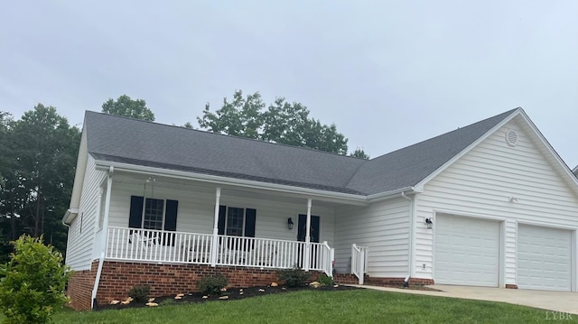 312 Addie Way, Lynchburg, VA 24501 - view of front facade featuring a porch, concrete driveway, an attached garage, a front yard, and a shingled roof