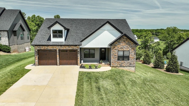 1151 Jefferson Meadows Dr, Forest, VA 24551 - view of front of house featuring stone siding, a shingled roof, a front lawn, and a garage