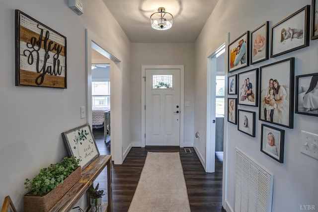 1151 Jefferson Meadows Dr, Forest, VA 24551 - entryway with dark wood-style flooring and baseboards