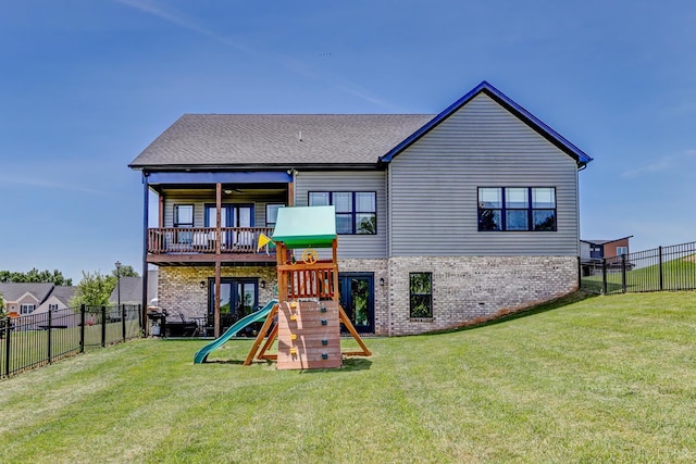 1151 Jefferson Meadows Dr, Forest, VA 24551 - back of house featuring a playground, brick siding, and roof with shingles