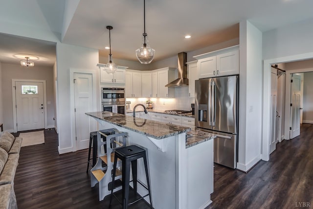 1151 Jefferson Meadows Dr, Forest, VA 24551 - kitchen featuring stainless steel appliances, wall chimney exhaust hood, baseboards, dark wood finished floors, and recessed lighting