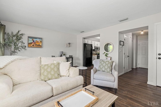 14 Jefferson Village Dr, Forest, VA 24551 - living room featuring dark wood finished floors and baseboards