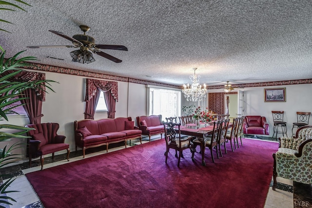 dining space featuring a ceiling fan, a chandelier, and a textured ceiling