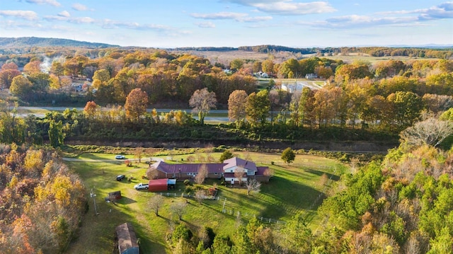 aerial view of property and surrounding area featuring rural landscape