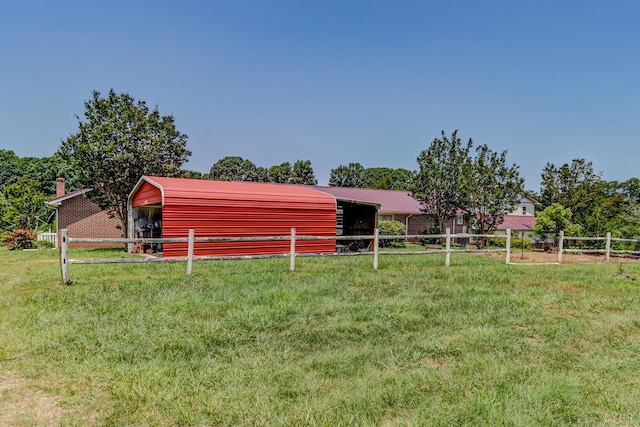 view of yard with an exterior structure