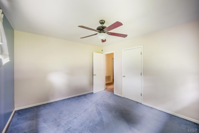 201 Oakland Cir, Lynchburg, VA 24502 - unfurnished bedroom with carpet floors, baseboards, and ceiling fan