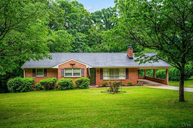 201 Oakland Cir, Lynchburg, VA 24502 - ranch-style house with a chimney, brick siding, an attached carport, and a front lawn