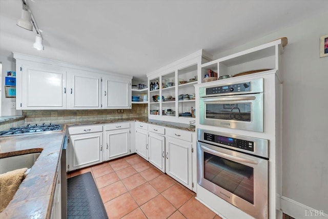 400 E Randolph Pl, Lynchburg, VA 24503 - kitchen with open shelves, white cabinetry, backsplash, and light tile patterned floors