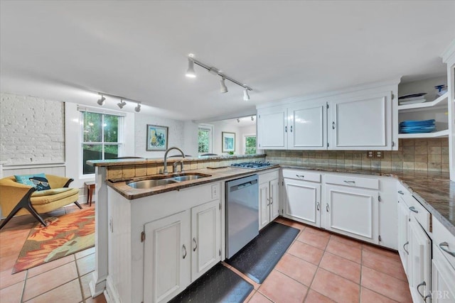 400 E Randolph Pl, Lynchburg, VA 24503 - kitchen featuring appliances with stainless steel finishes, a sink, a peninsula, and white cabinets