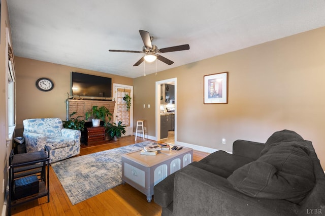 1703 Dale Ave, Altavista, VA 24517 - living room with light wood-style flooring, ceiling fan, and baseboards