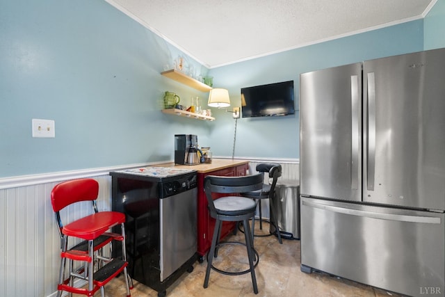 1703 Dale Ave, Altavista, VA 24517 - kitchen featuring freestanding refrigerator, crown molding, a wainscoted wall, and open shelves