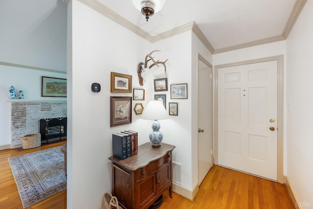 921 Peaksview St, Bedford, VA 24523 - entrance foyer with ornamental molding, light wood-style flooring, and baseboards