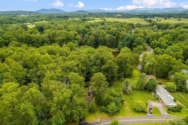 921 Peaksview St, Bedford, VA 24523 - aerial view of a heavily wooded area and a mountainous background