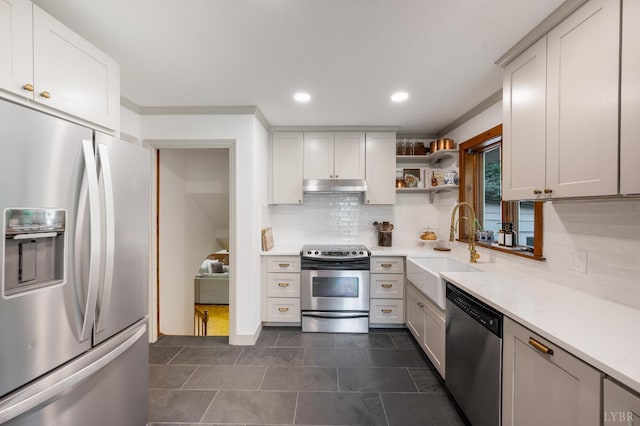 921 Peaksview St, Bedford, VA 24523 - kitchen featuring appliances with stainless steel finishes, a sink, under cabinet range hood, light countertops, and recessed lighting