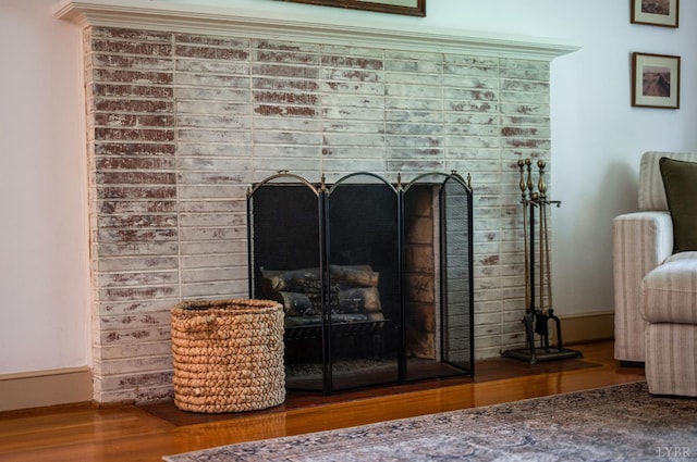 921 Peaksview St, Bedford, VA 24523 - detailed view of a brick fireplace, wood finished floors, and baseboards