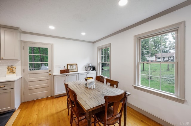 921 Peaksview St, Bedford, VA 24523 - dining space with healthy amount of natural light, light wood finished floors, crown molding, and recessed lighting