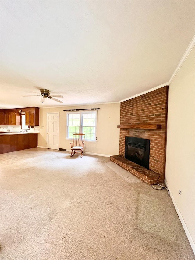 166 Matohe Rd, Monroe, VA 24574 - unfurnished living room with crown molding, light carpet, a fireplace, and a ceiling fan