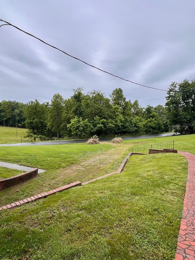 166 Matohe Rd, Monroe, VA 24574 - view of green lawn featuring a forest view