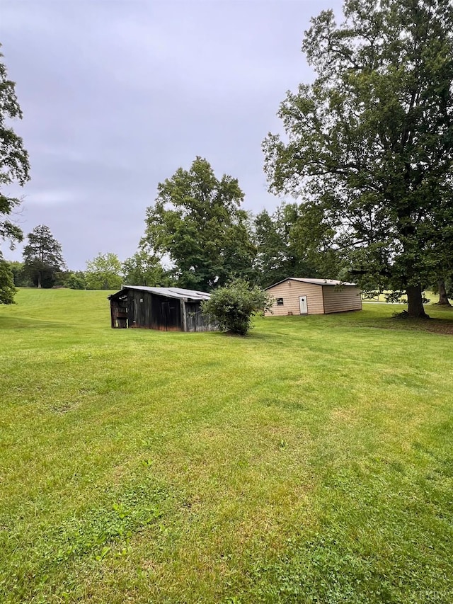 166 Matohe Rd, Monroe, VA 24574 - view of grassy yard with an outbuilding
