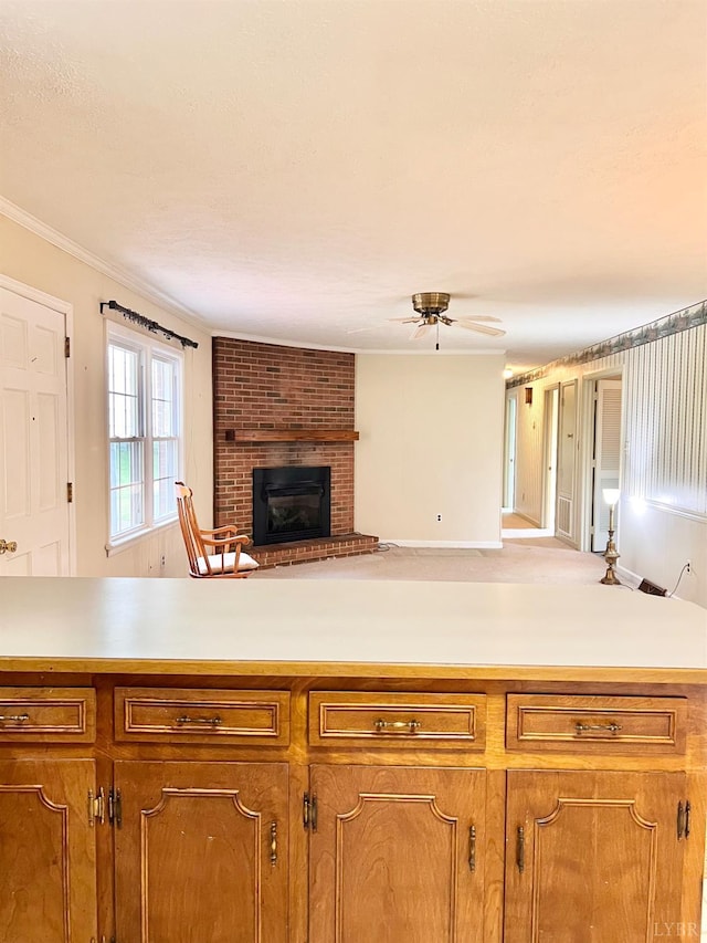 166 Matohe Rd, Monroe, VA 24574 - kitchen featuring light countertops, open floor plan, a ceiling fan, and crown molding