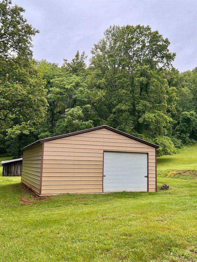 166 Matohe Rd, Monroe, VA 24574 - detached garage with a view of trees