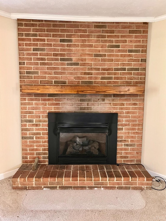 166 Matohe Rd, Monroe, VA 24574 - detailed view of crown molding, a brick fireplace, and carpet