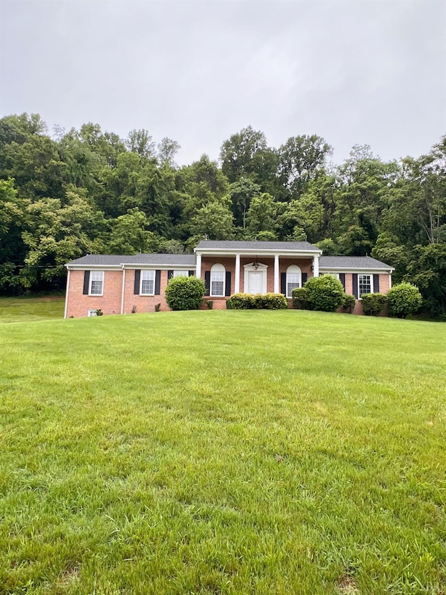 166 Matohe Rd, Monroe, VA 24574 - single story home with a front lawn and brick siding