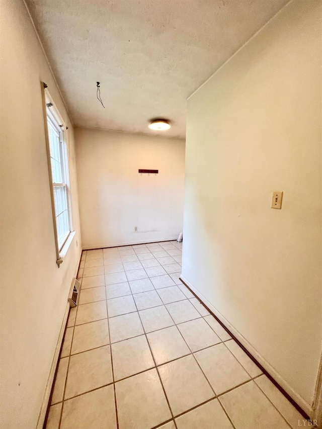 166 Matohe Rd, Monroe, VA 24574 - unfurnished room with a textured ceiling and light tile patterned floors