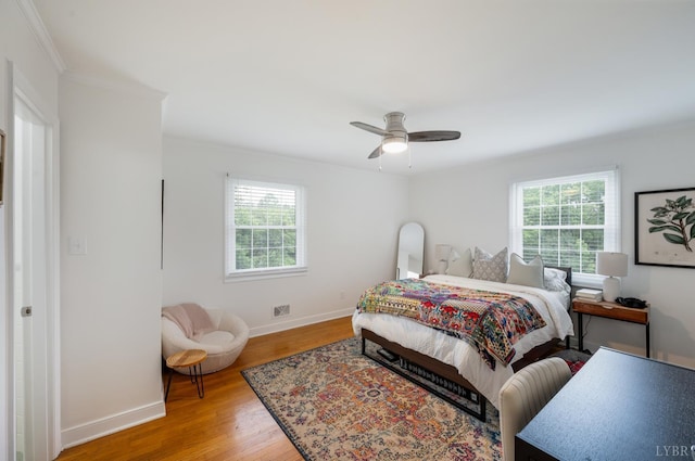 6012 Rhonda Rd, Lynchburg, VA 24502 - bedroom featuring multiple windows, baseboards, light wood-type flooring, and crown molding