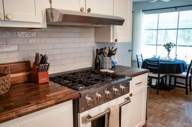 6012 Rhonda Rd, Lynchburg, VA 24502 - kitchen featuring under cabinet range hood, stainless steel range, wood counters, and white cabinetry