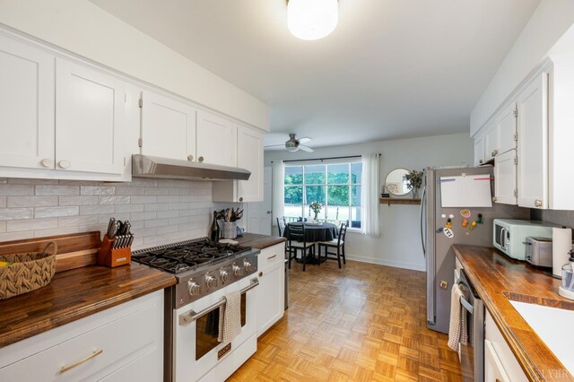6012 Rhonda Rd, Lynchburg, VA 24502 - kitchen with butcher block countertops, appliances with stainless steel finishes, under cabinet range hood, and a ceiling fan