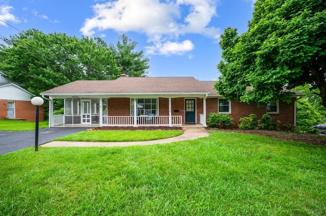 6012 Rhonda Rd, Lynchburg, VA 24502 - ranch-style home with covered porch, a front lawn, brick siding, and a chimney