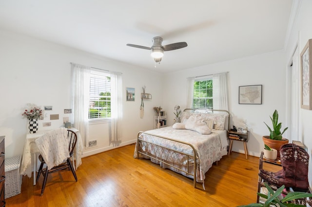 6012 Rhonda Rd, Lynchburg, VA 24502 - bedroom with light wood finished floors, ceiling fan, crown molding, and baseboards