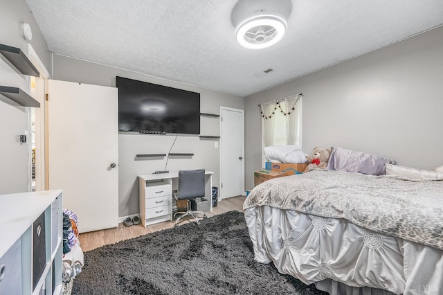 2523 Clarks Rd, Rustburg, VA 24588 - bedroom featuring light wood-style flooring and a textured ceiling