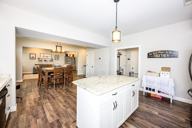 1480 Pilgrim Rd, Goode, VA 24556 - kitchen with dark wood finished floors, light stone counters, hanging light fixtures, white cabinets, and a kitchen island