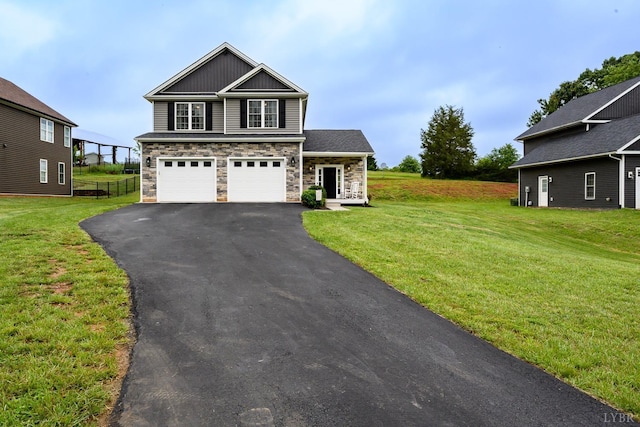 1480 Pilgrim Rd, Goode, VA 24556 - craftsman inspired home featuring driveway, stone siding, a front lawn, and an attached garage