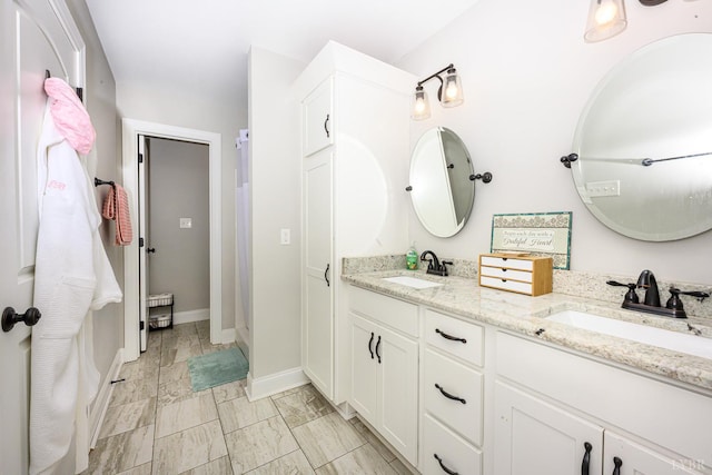 1480 Pilgrim Rd, Goode, VA 24556 - full bath featuring double vanity and baseboards