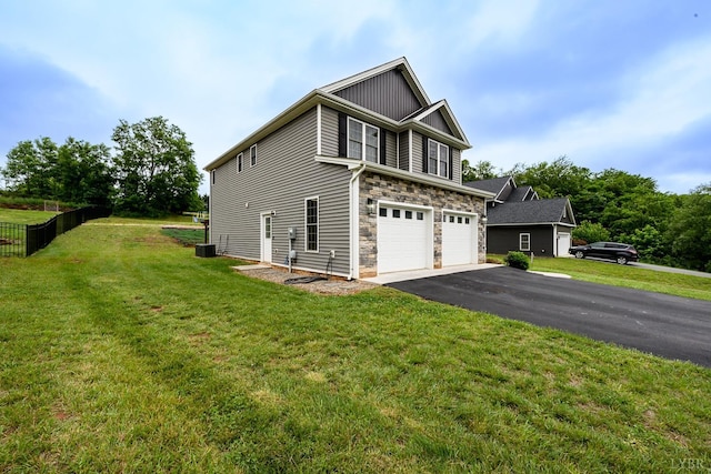 1480 Pilgrim Rd, Goode, VA 24556 - view of side of property featuring stone siding, asphalt driveway, and an attached garage