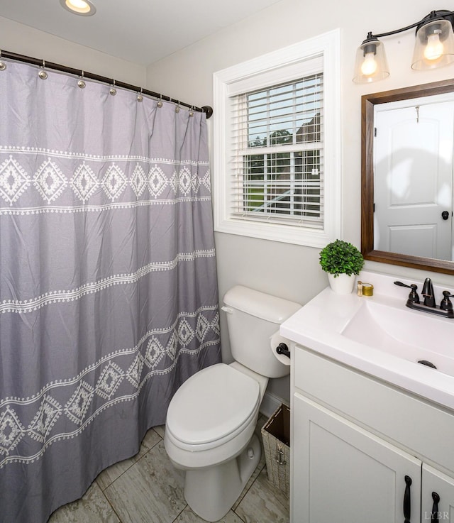 1480 Pilgrim Rd, Goode, VA 24556 - bathroom featuring toilet, vanity, and marble finish flooring