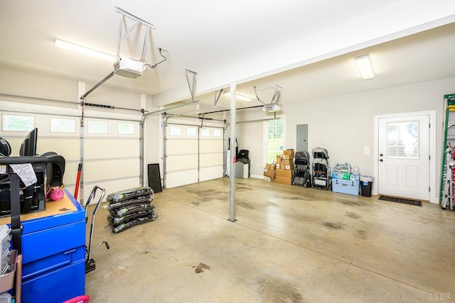1480 Pilgrim Rd, Goode, VA 24556 - garage featuring a garage door opener and electric panel
