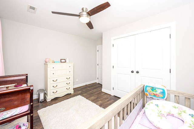 1480 Pilgrim Rd, Goode, VA 24556 - bedroom with dark wood-style flooring, baseboards, a closet, and ceiling fan