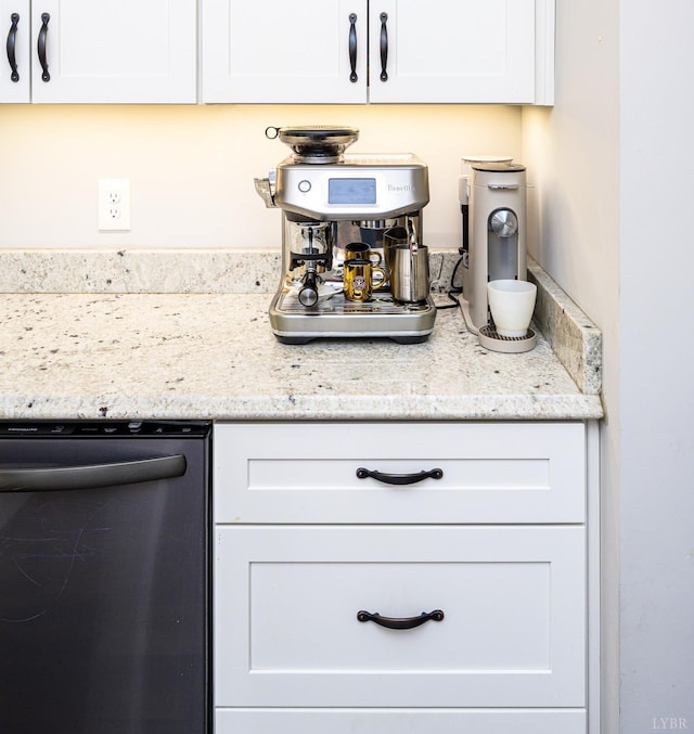 1480 Pilgrim Rd, Goode, VA 24556 - detailed view of stainless steel dishwasher, white cabinets, and light stone countertops