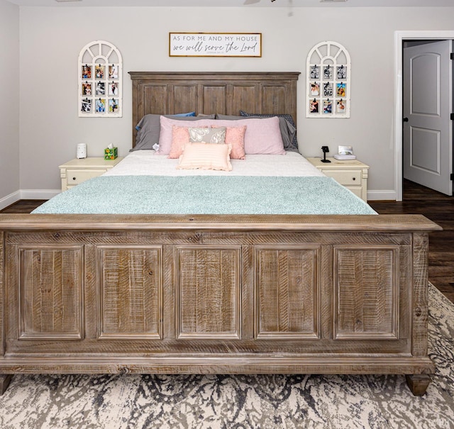 1480 Pilgrim Rd, Goode, VA 24556 - bedroom featuring baseboards and dark wood-style flooring