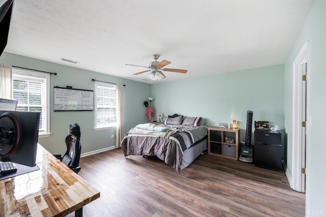 1053 Hupps Hill Ln, Forest, VA 24551 - bedroom featuring wood finished floors, ceiling fan, and baseboards